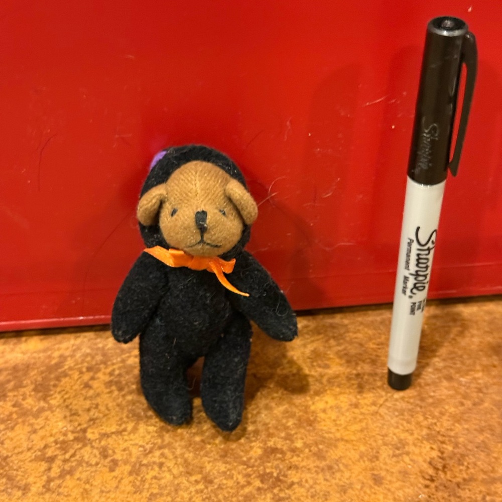 Tiny Black Felt Bear with Orange Bow
